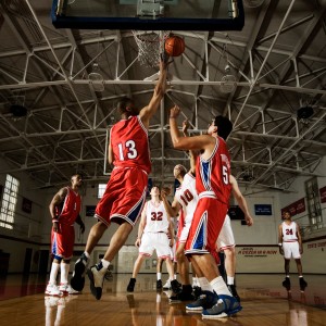 Basketball game, player shooting a basket